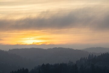 idyllic sunset over the mountains of upper franconia