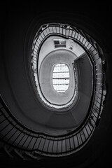 Fototapeta premium Ancient circular staircase indoors. 2018