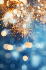 Fototapeta premium Festive blue background with fireworks, lights, and golden bokeh, sparkling particles in a cheerful atmosphere.