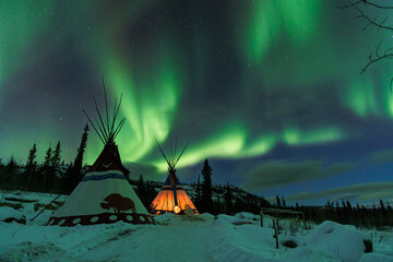 Aurora borealis over the mountains, Yukon, Canada