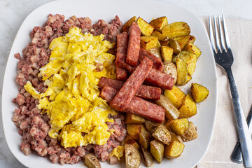 scramble eggs with corn beef hash and spam fries
