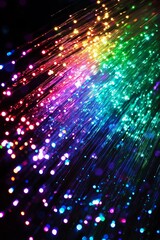Fototapeta premium Vibrant array of fiber optic lights creates a captivating visual effect with colorful sparkles and glow.