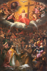 SPELLO, ITALY - MAY 18, 2024: The  painting of  Adoration of Holy Trinity in the church Chiesa di San Severino by Giacinto Boccanera from 18. cent.