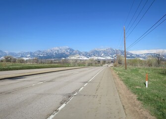 Boulder Flatirons in spring seen from the road side, Colorado