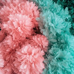 Fototapeta premium Close-up of pink and teal artificial flowers.