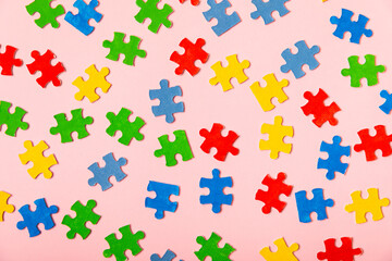 Naklejka premium Autism puzzle.Autism awareness day. Colorful bright puzzles.Puzzle. 2 April world autism awareness day background. Top view. Space for text.Copy space.Design element.Care Awareness campaign for Autism