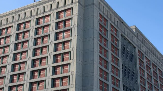 jail building exterior in metropolitan brooklyn new york city (detention center prison holding cell area) criminals crimes criminal commit felony state federal facility industry city sunset park