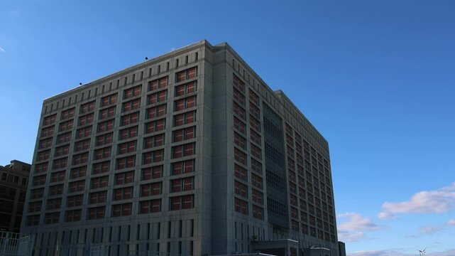 jail building exterior in metropolitan brooklyn new york city (detention center prison holding cell area) criminals crimes criminal commit felony state federal facility industry city sunset park