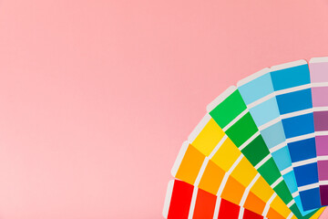 Color palette on a bright colored background. Color palette guide. paper catalog of rainbow color....