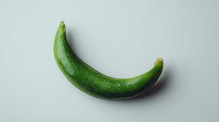 Single, fresh, green snow pea on white.