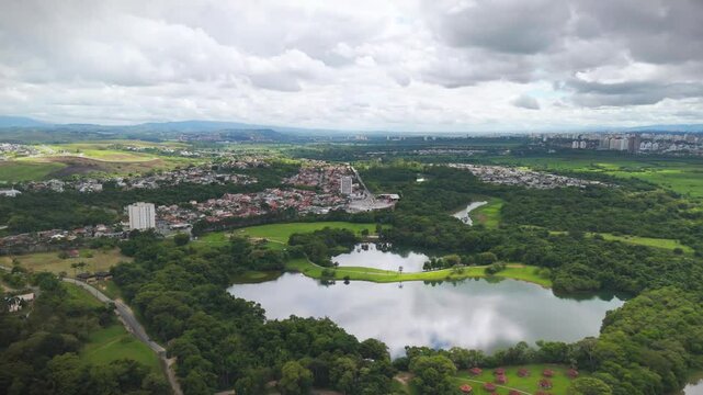 aerial view of the countryside of Sao Paulo state in Brazil with views of river and mountains and a few clouds