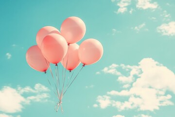Bright Balloons Floating Against a Blue Sky