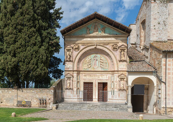 Fototapeta premium PERUGIA, ITALY - MAY 16, 2024: The facade of church Oratorio dei Santi Andrea e Bernardino with the relief of St. Bernardine of Siena