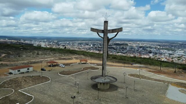 vitoria da conquista, bahia, brazil - march 23, 2023: aerial view of the sculpture of christ by artist mario cravo in the city of vit&oacute;ria da conquista.