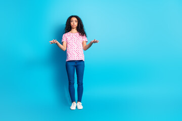 Full length photo of doubtful attractive lady dressed pink t-shirt shrugging shoulders empty space...
