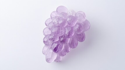 Obraz premium Cluster of amethyst shaped like grapes against white background