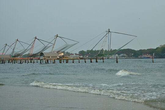 Fort kochi beach, fishing net, chenavala on the beach, Cochin tourism, Kerala, South India 