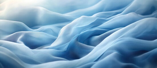 Obraz premium Soft blue fabric with gentle waves.