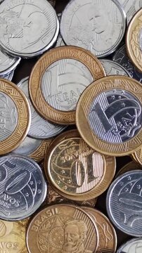 Brazilian real coins rotating close up