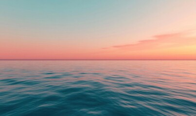 Obraz premium Serene ocean view at sunset, showcasing calm waters and pastel skies.