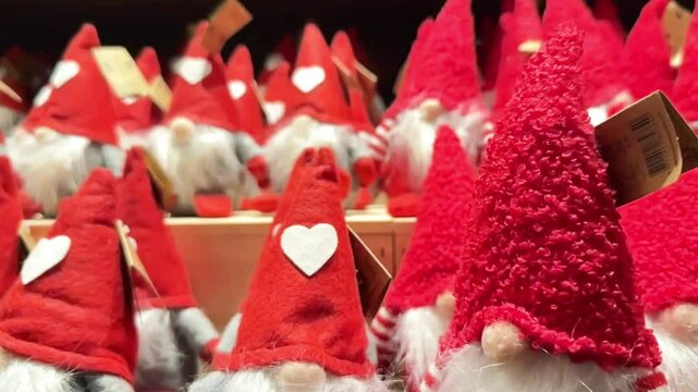 Christmas gnomes on a shelf in a store