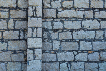 Historical brick wall on grunge grey colour  pattern wallpaper background. ABstract backdrop. 