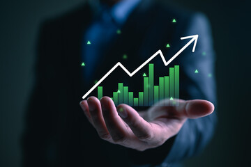 Planning and strategy, Stock market, Business growth, progress or success concept. Businessman or trader is showing a growing virtual hologram stock, invest in trading. Height return.