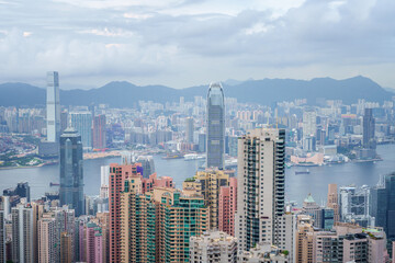 Obraz premium The Peak viewpoint of lanscape Hong Kong cityscape skyline and Victoria harbor at the roof top of The Peak Tower Sky Terrace 428, Hong Kong, China.