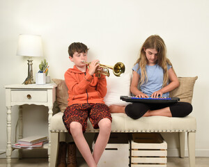 Children at Home Playing Musical Instruments Together