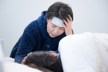 子どもの風邪がうつって一緒に発熱する母親　家庭内パンデミック