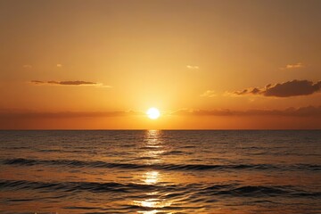 Obraz premium sunset over the ocean with a small boat in the distance