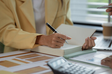 diverse team working together in modern co-working space, business people having casual discussion during meeting, marketing, accounting, finance, Team working ambitiously in an office room.