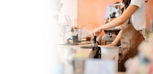 barista brewing fresh coffee in a cozy cafe setting. Showcasing coffee preparation, cafe