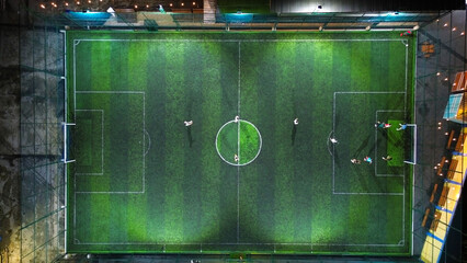 Soccer field with green grass. Football field top view. Aerial view. © Palugada
