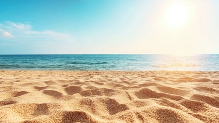 Golden sand stretches along a tranquil tropical beach, meeting beautiful blue waters under a bright sun, perfect for relaxation or play