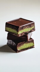 Dubai Chocolate Kunafa Pistachio on white background,Dubai Chocolate bar with green kadayif and pistachio spread,popular and viral chocolate 2024,space for text.