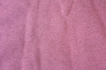 Simple pale pink jersey fabric from above