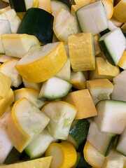 sliced farm fresh organic yellow squash and zucchini (courgette)