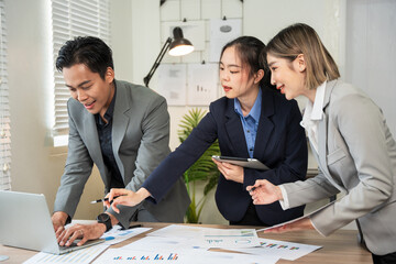 Asian business Talk about new projects, presents at home office.
