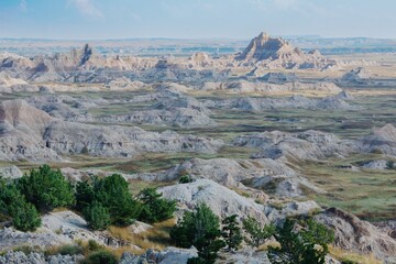 Panoramic view of Badlands National Park. Unique rock formations and sparse vegetation. Nature's artistry. Badlands National Park, Interior, South Dakota, USA.