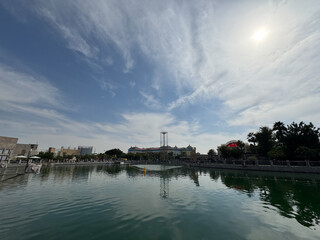 A vibrant snapshot of Riverland Dubai, where charming cobblestone streets, picturesque bridges, and scenic waterways transport you to a world of timeless charm. Lush greenery and European-style.