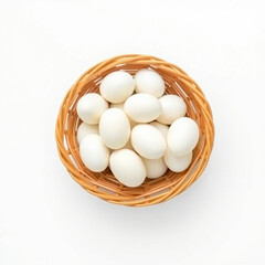 group pristine white eggs rests inside a light brown wicker basket.