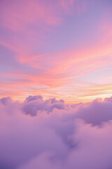 Obraz premium dreamy pastel sky with fluffy clouds at dawn