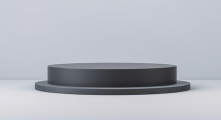 dark gray cylindrical pedestal on light gray surface