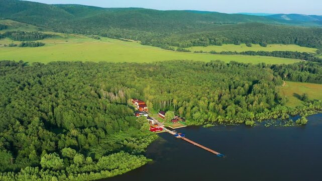 Southern Urals, Bashkortostan, the Sapsan rest house on the shore of the Nugush reservoir. Aerial view.