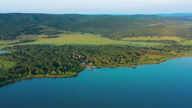 Southern Urals, Bashkortostan, the Sapsan rest house on the shore of the Nugush reservoir. Aerial view.