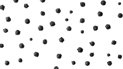 Scattered dark grey spheres on black background.