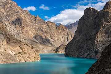 Attabad Lake at Dawn captured between dramatic canyon walls in Hunza Valley, Gilgit-Baltistan, Pakistan.