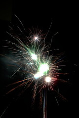 close of fireworks in the night sky background 