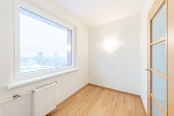 Modern Bright Room With Large Window and Wooden Flooring. Home Interior